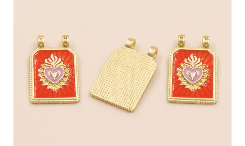 Medalla Sagrado Corazón 30*17 Naranja y Lila