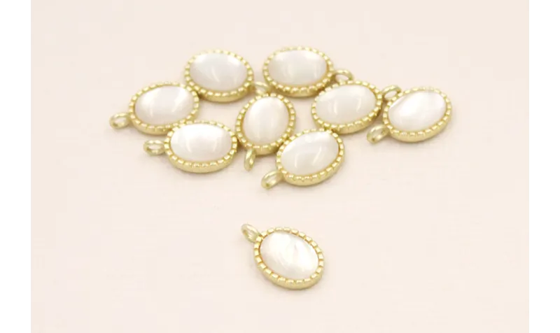 Colgante 10*7mm Dorado Mate con Pieza Opal