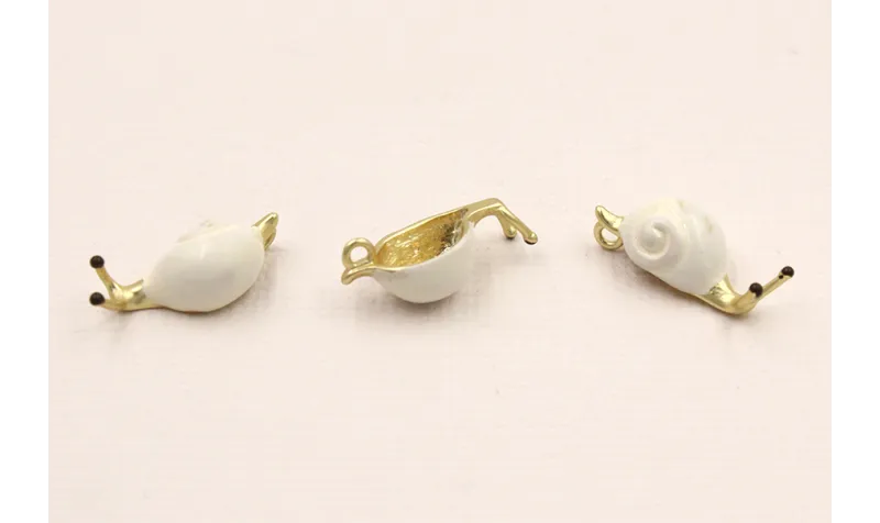 Cuenta Caracol 18*5*6mm Oro Mate y Crema