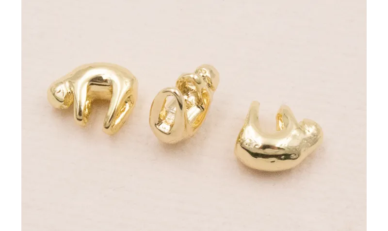 Cuenta Koala 9*5mm Oro