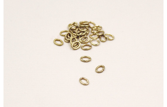 ARANDELA PEQ OVAL Dorada Mate 40*28*07