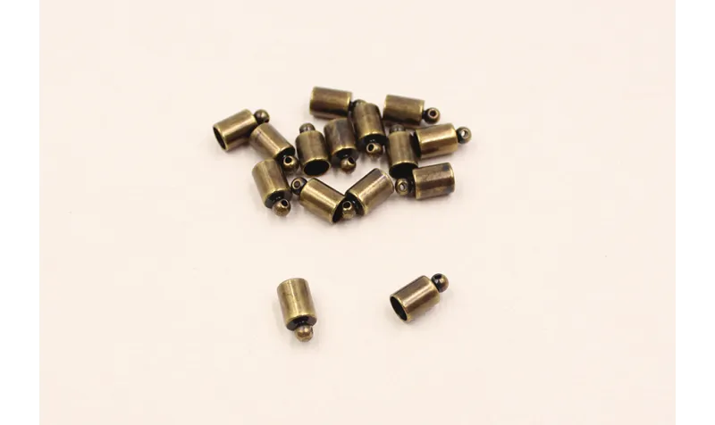 Terminal pequeño oro viejo 10mm long / Cuentas Metálicas de Latón / Zamak