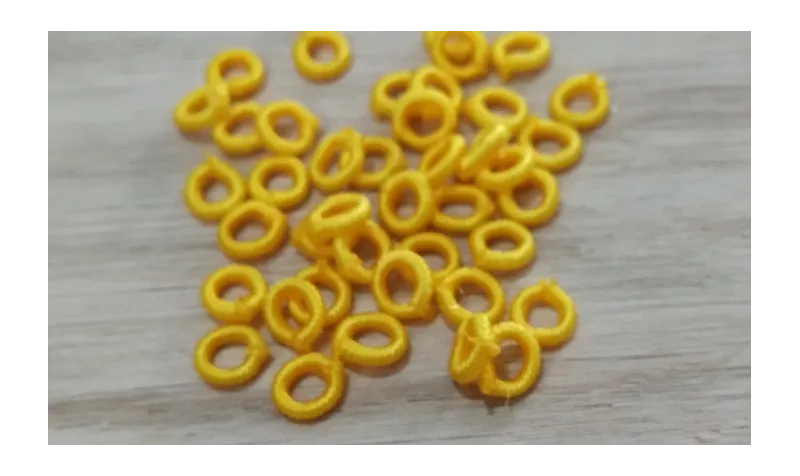 Aro Elástico 5mm. Agujero de 3mm. Amarillo Huevo /Cuentas de  Tela 