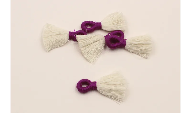 Fleco 35mm blanco y  morado /Cuentas de  Tela