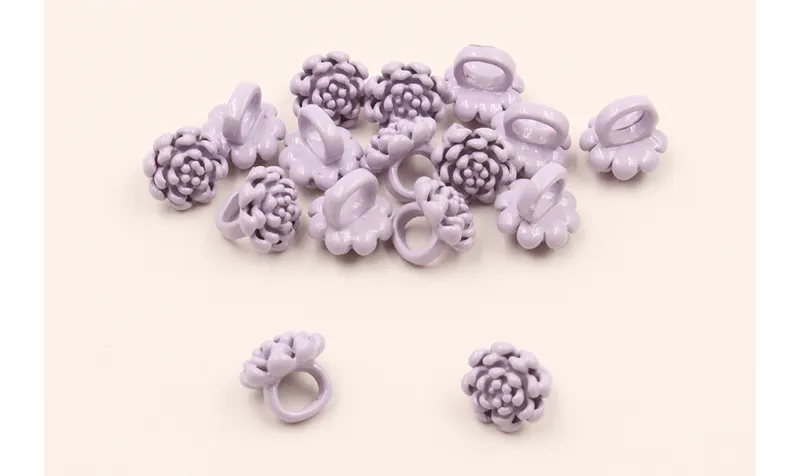 Flor de 7mm con anilla de 4mm interior  Lila