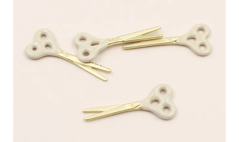 Cuenta Tijeras 25*10 esmaltadas Visón