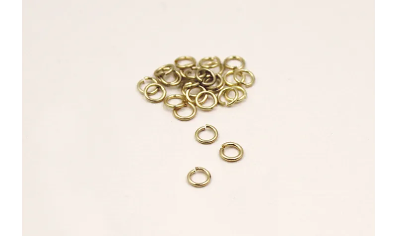 ARANDELA RED.4mm diámetro * 0,8. DORADA Mate / Arandelas de Latón / Zamak
