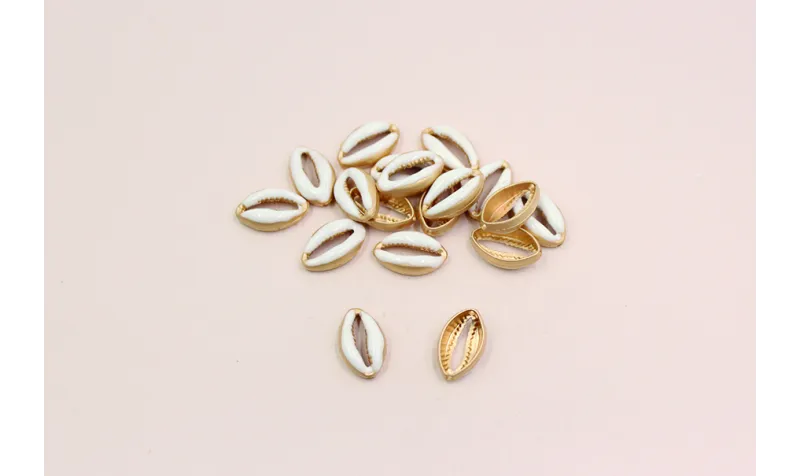 Pieza caracola  pasante 15*9mm Oro Mate y Blanco