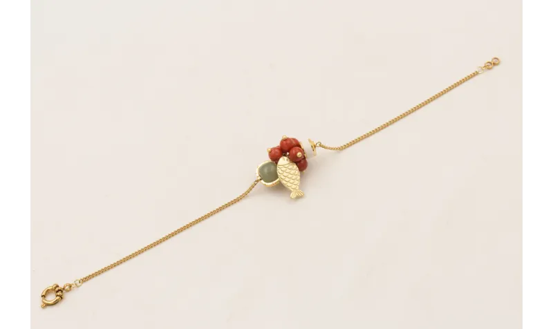 Pulsera piezas pasantes de cristal verde y blanca,
