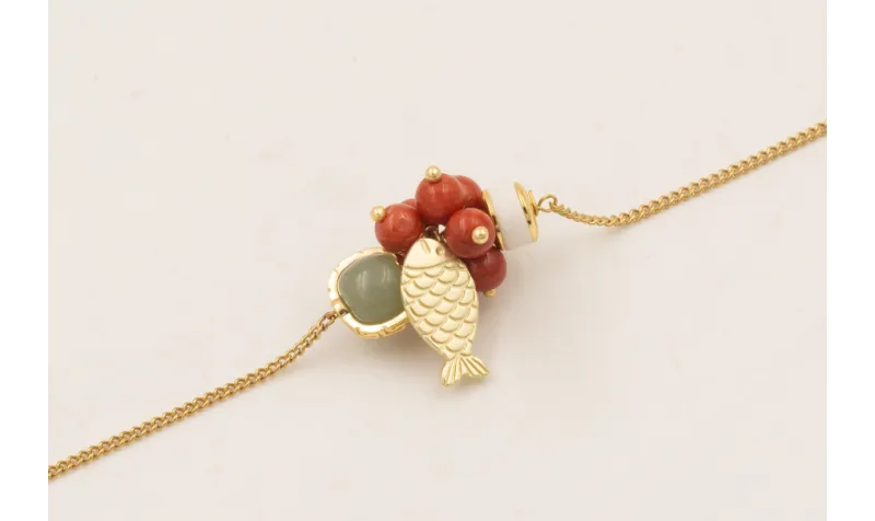 Pulsera piezas pasantes de cristal verde y blanca,
