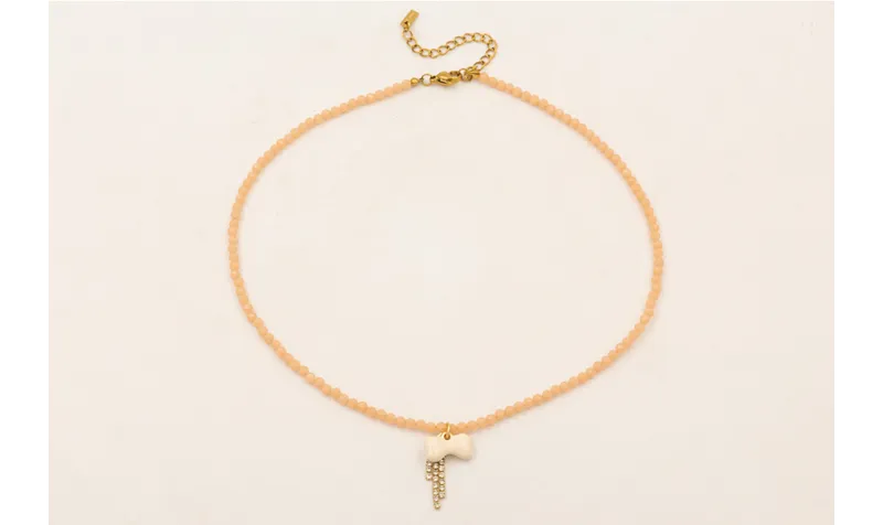 Collar de semipreciosas facetadas rosas con hueso