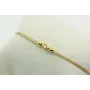 Pulsera de macrame en color oro palido y brillo de
