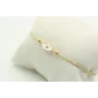 Pulsera de macrame en color oro palido y ojo turco