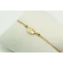 Pulsera de macrame en color oro palido y ojo turco