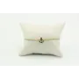 Pulsera de macrame en color oro palido y ancla dor