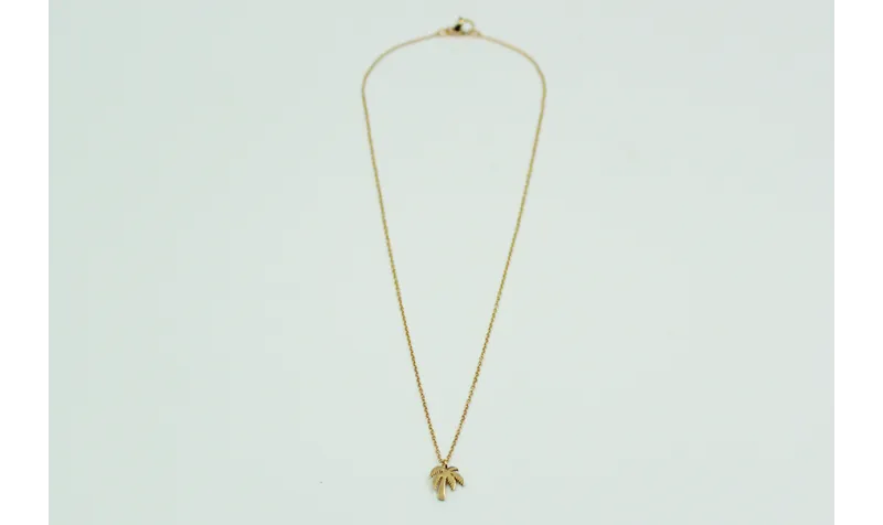 Solitario con cadena de eslabón pequeño dorado y c