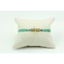Pulsera lazo liberty azul con flores blancas, macr