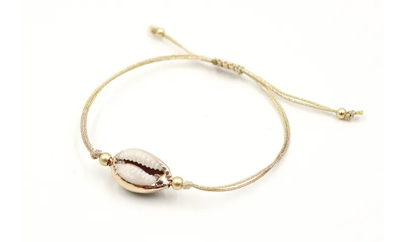 Pulsera hilo macrame dorado con concha esmaltada b