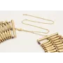 Collar babero en oro mate con entrepiezas alargada