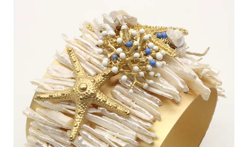 Brazalete listones perlas, con estrellas en oro ma