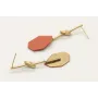 Pendientes perno nudo largo en oro mate y pieza es