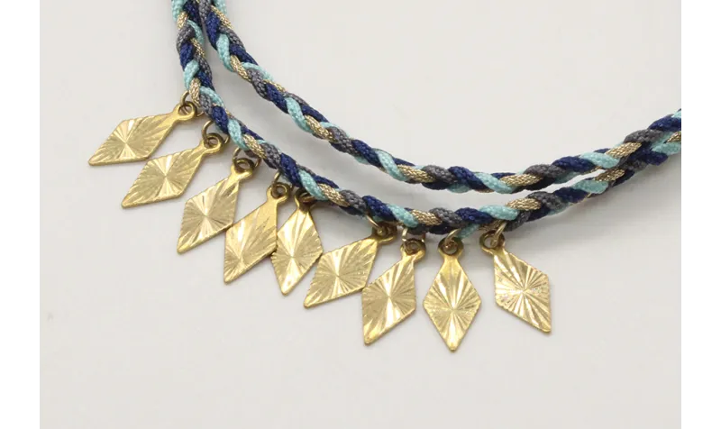 Pulsera trenza macrame azules con rombos en oro y 