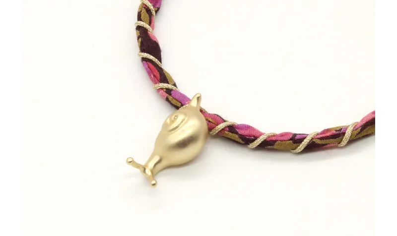 Pulsera rigida forrada con liberty marrón,morado e