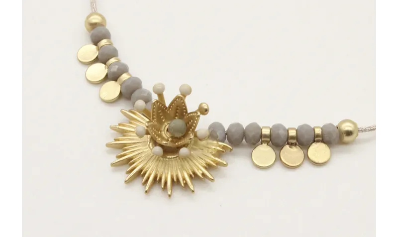 Pulsera hilo macrame plateado con facetadas grises