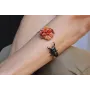 Pulsera rigida con escarabajo esmaltado negro y bu