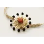 Pulsera nudo serpiente oro palido con sol,casquill
