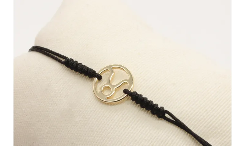 Pulsera nudo serpiente negro con signo del zodiaco