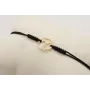 Pulsera nudo serpiente negro con signo del zodiaco