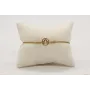 Pulsera nudo serpiente dorado con signo del zodiac