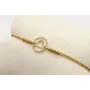 Pulsera nudo serpiente dorado con signo del zodiac