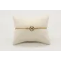 Pulsera nudo serpiente dorado con signo del zodiac