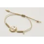 Pulsera nudo serpiente en oro palido con sol y dis