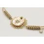 Pulsera nudo serpiente en oro palido con sol y dis
