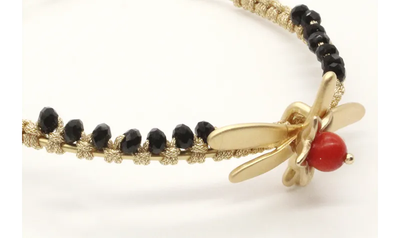 Pulsera rigida macrame oro palido con facetadas ne