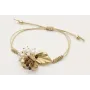 Pulsera nudo serpiente en oro palido con hoja, flo