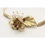 Pulsera nudo serpiente en oro palido con hoja, flo