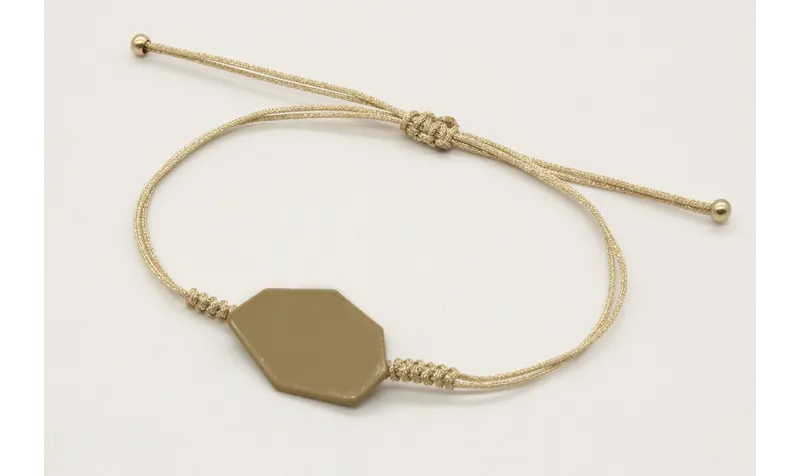 Pulsera nudo serpiente oro palido con pieza esmalt