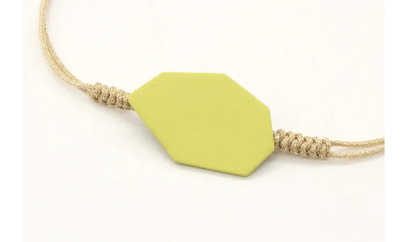 Pulsera nudo serpiente oro palido con pieza esmalt