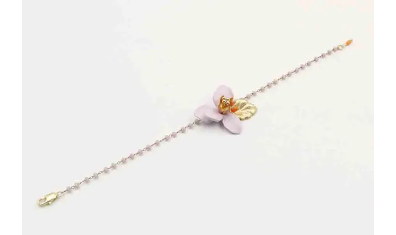 Pulsera cadena facetadas lilas, hoja oro mate,flor