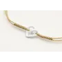 Pulsera nudo serpiente dorado con corazón hueco bl