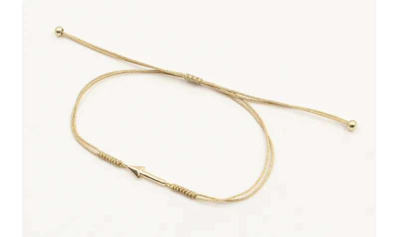 Pulsera nudo serpiente dorado con flecha dorada. E