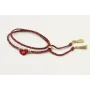 Pulsera trenzada hilo rojo vivo y oro con chapa co