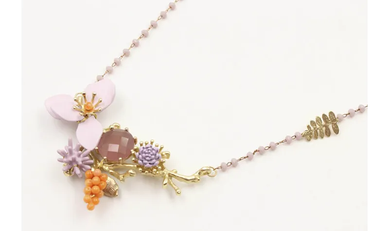 Collar cadena facetadas lilas con rama de coral or