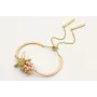 Pulsera semirigida con bolas rositas, estrella oro