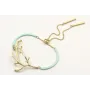 Pulsera semirrigida en turquesa con rama de coral 