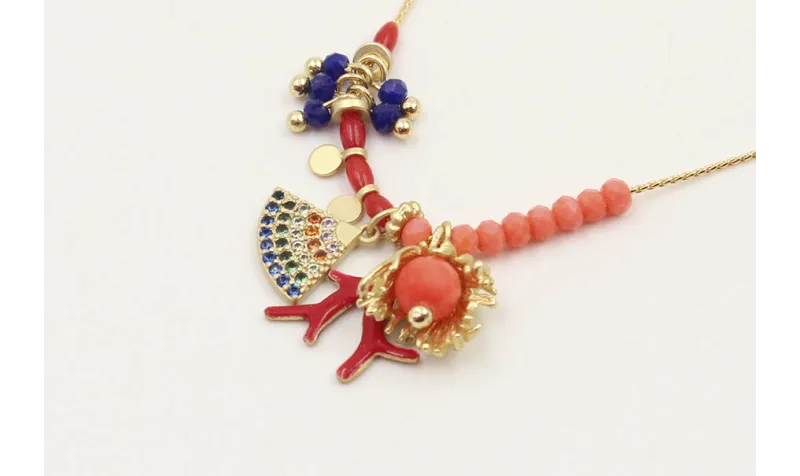 Collar cadena fina oro con facetadas coral, rama p